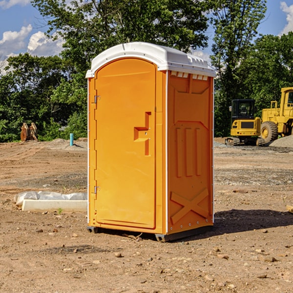 how often are the portable restrooms cleaned and serviced during a rental period in Reynolds